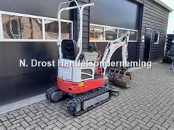 Takeuchi TB 210 R minigraver met 3 bakken